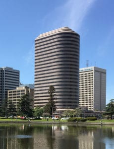 our oakland office building from across the lake